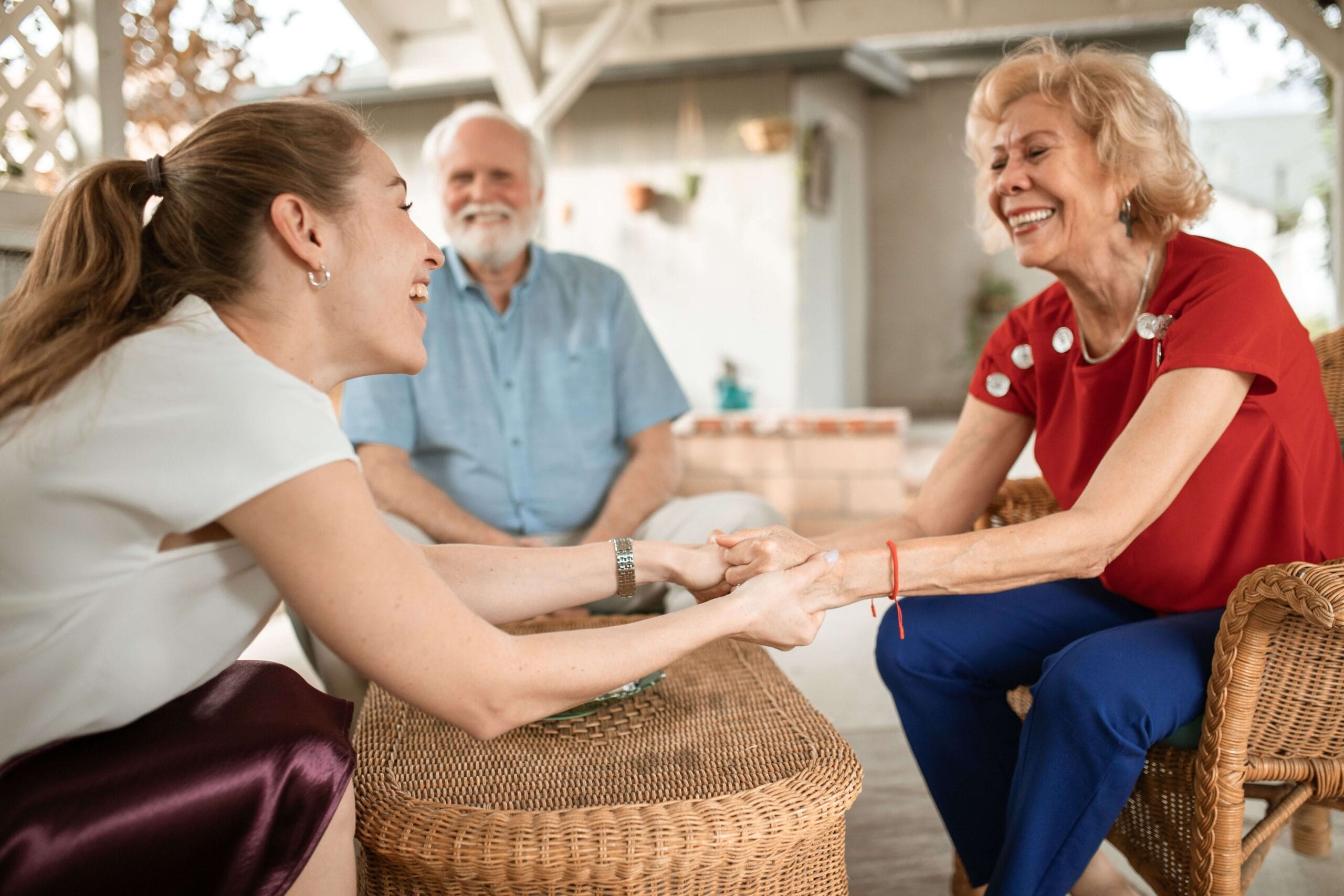 CareO'Clock caregiver with a happy family enjoying home care support in Bedford Nova Scotia