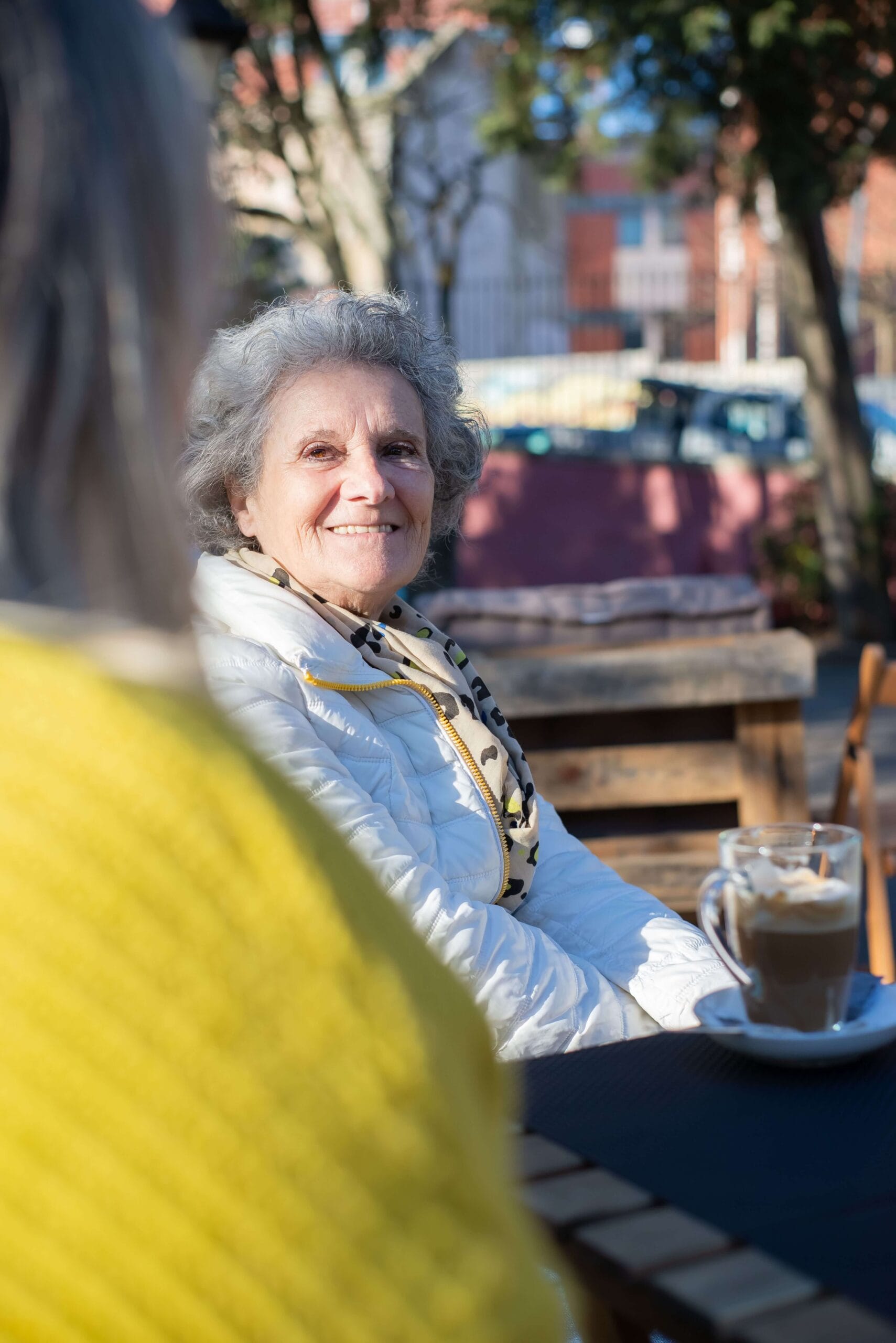 Senior client enjoying a quiet cup of coffee at home with a CareO'Clock caregiver in Bedford Nova Scotia